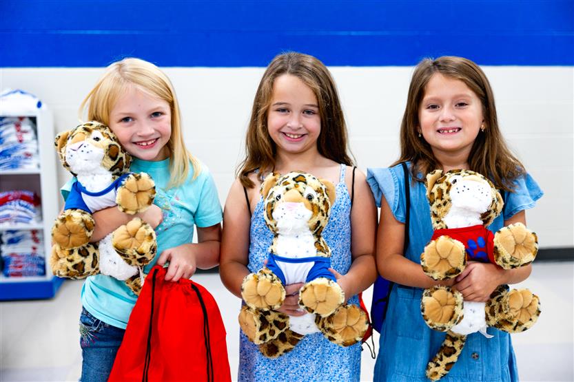 Students build a cheetah at a community event